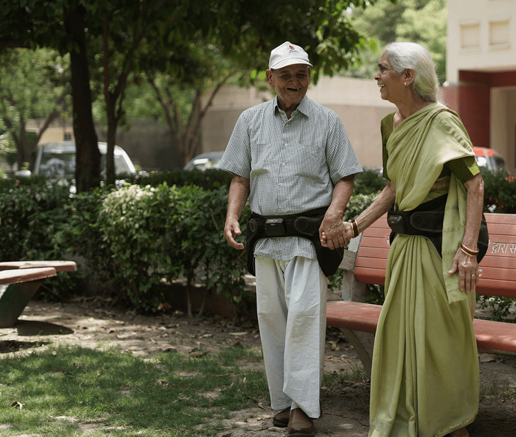 Elderly woman confidently walking with the Ripple HipPro Belt